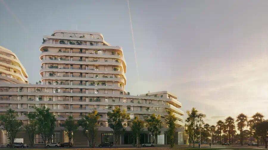 Contemporary curved façade of the Málaga beachfront development