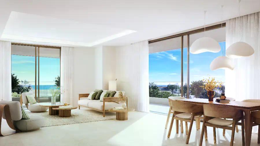 Bright open-plan living room with sea view
