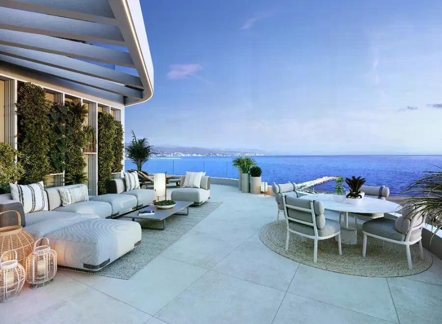 Penthouse dining terrace overlooking the sea