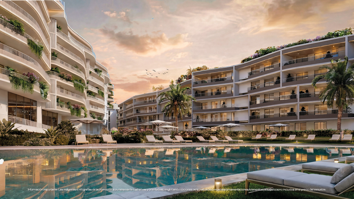 Communal swimming pool surrounded by landscaped gardens